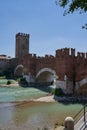 View of the Castel Vecchio Bridge connected to Castelvecchio Castle along Adige river in Verona, Italy - July, 2022 Royalty Free Stock Photo